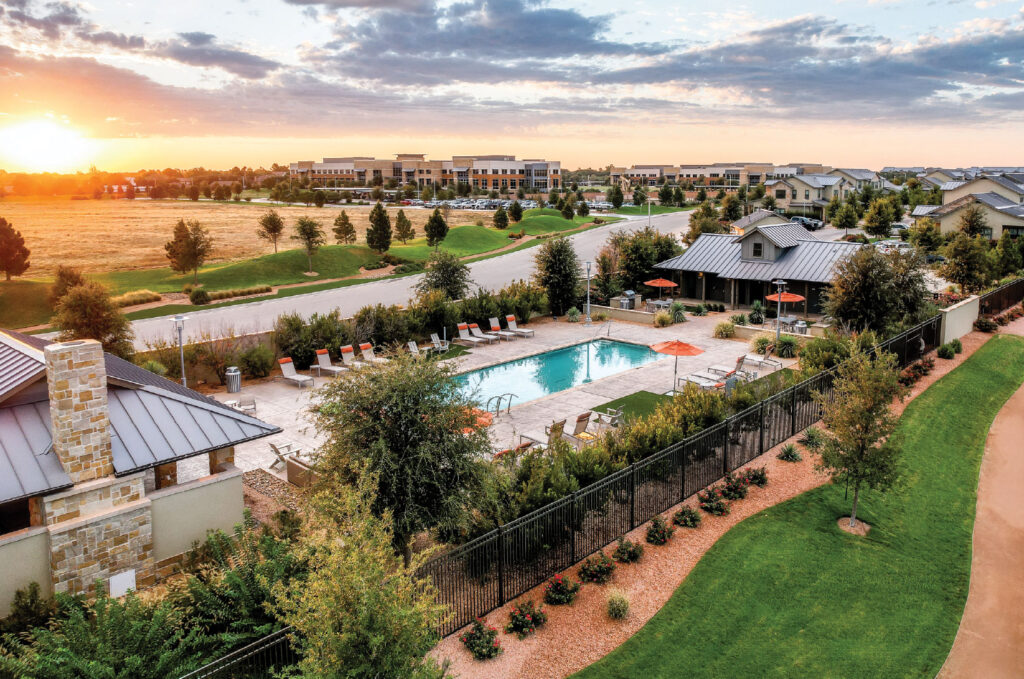 Rendering of Vineyard community center with resort style pool and splash pad.