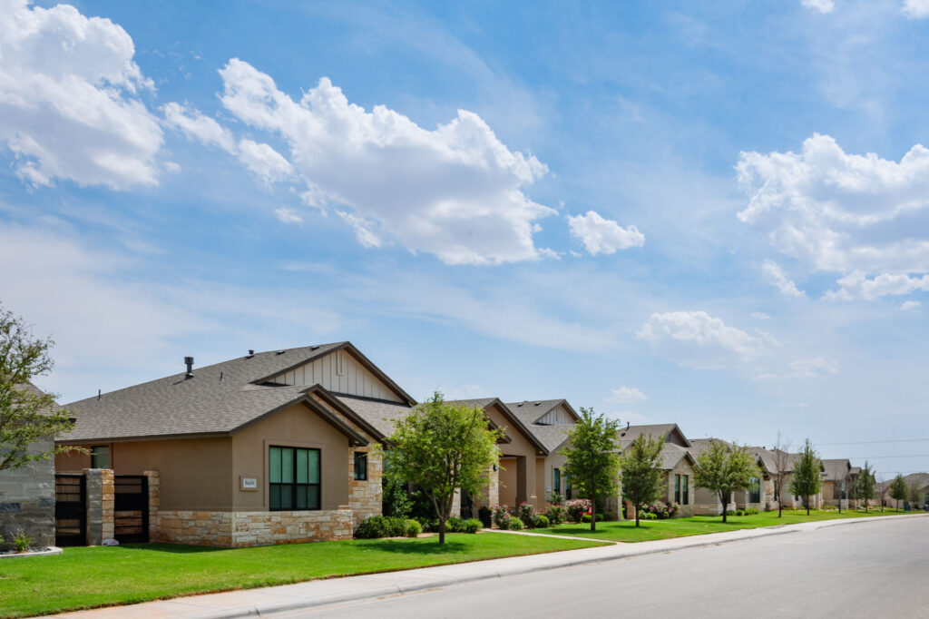 Street view of suburban homes in the Vineyard community in Midland, Texas