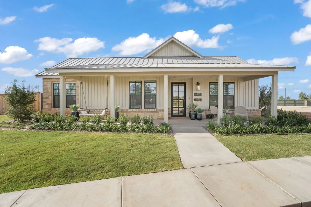 Exterior view of The Vineyard Preserve's model home. Maintenance-free front lawn care. 
