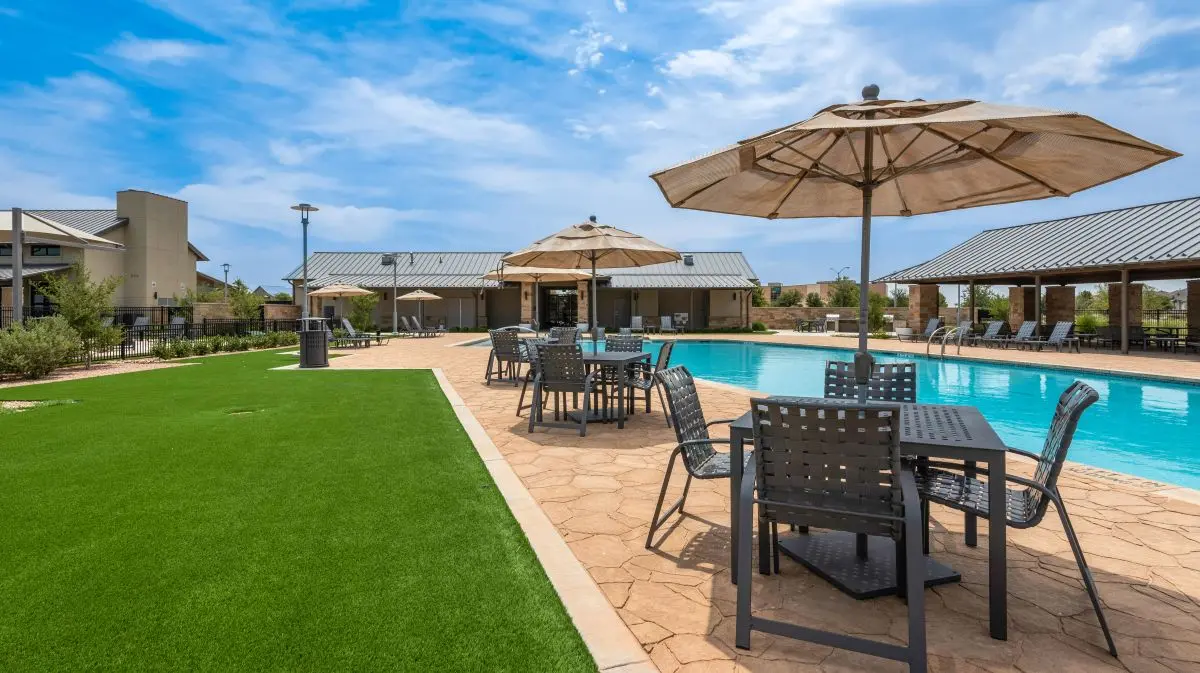 The Vineyard Preserve's resort-style pool with shaded seating.
